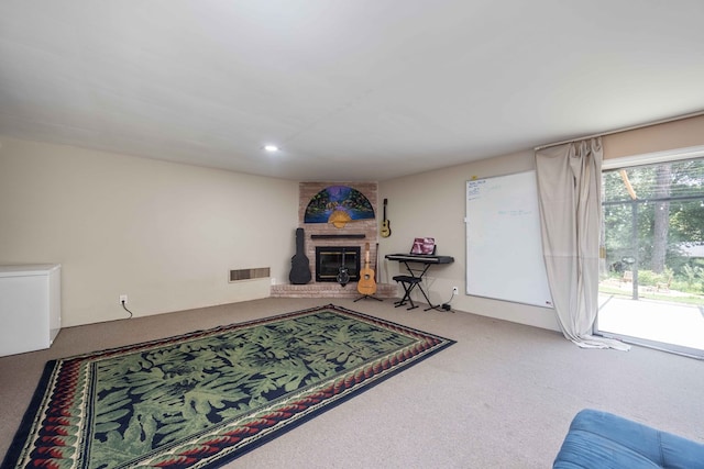 2618 Habersham Ave, Columbus, GA 31906 - carpeted living room with a brick fireplace and recessed lighting