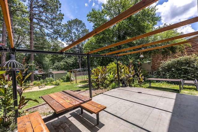 2618 Habersham Ave, Columbus, GA 31906 - view of patio / terrace with a fire pit and a shed