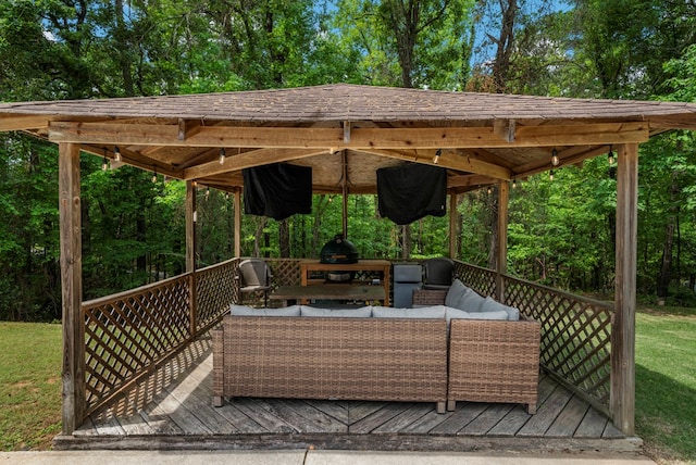 deck with outdoor lounge area and a gazebo