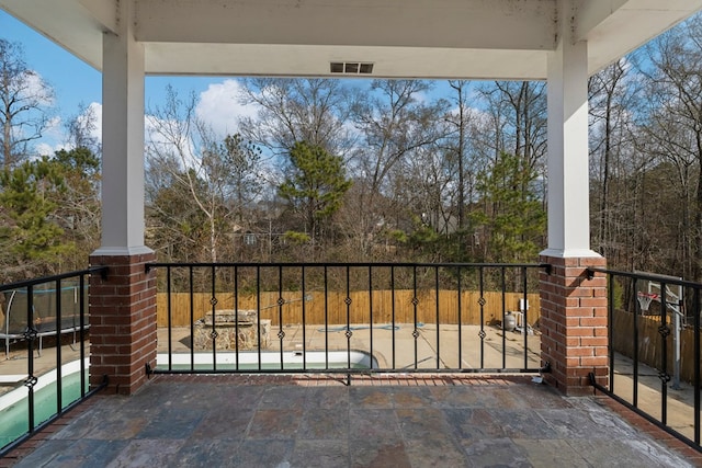 balcony with a patio area