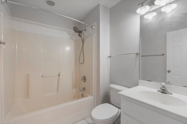 full bathroom with toilet, vanity, and  shower combination