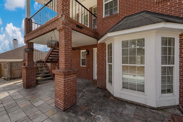 view of patio with a balcony