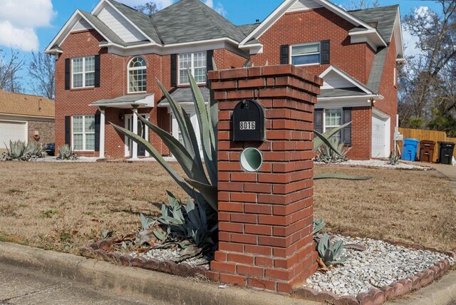 view of front of home with a front yard