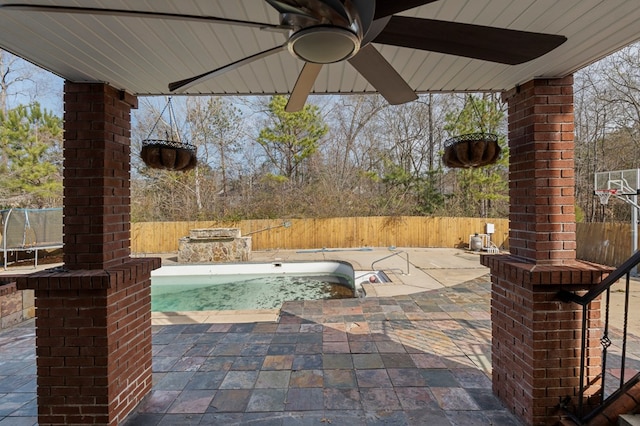 view of patio / terrace featuring a fenced in pool