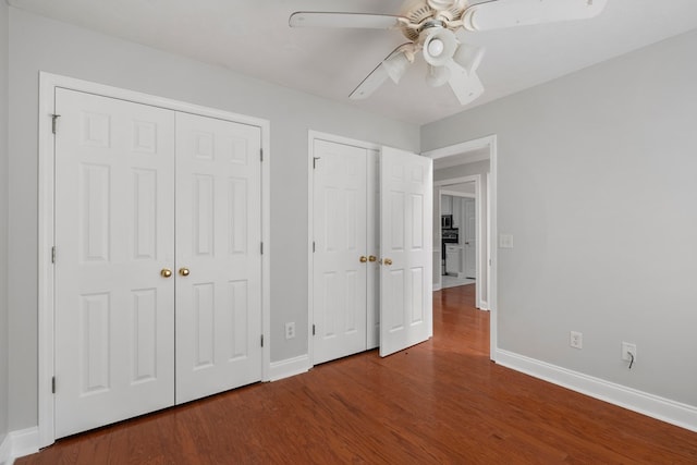 unfurnished bedroom with hardwood / wood-style floors and ceiling fan