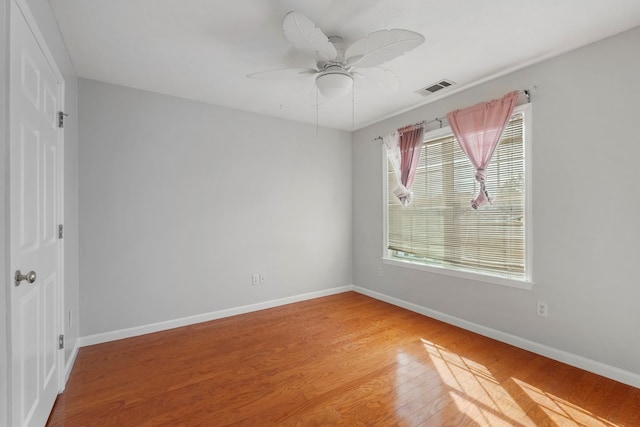 unfurnished room featuring wood-type flooring and ceiling fan