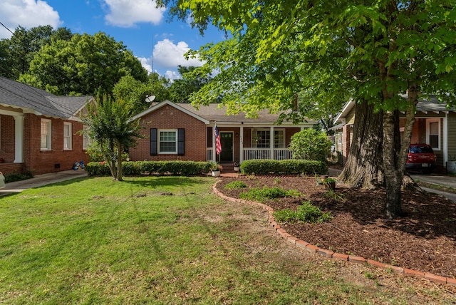 1445 22nd St, Columbus, GA 31901 - single story home featuring covered porch, a front yard, and brick siding