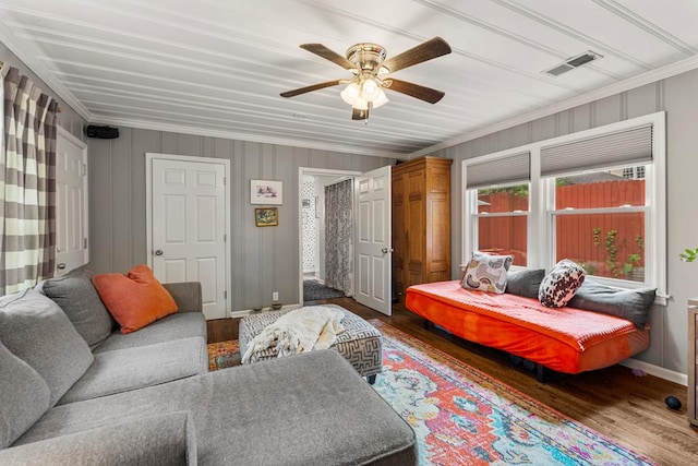 1445 22nd St, Columbus, GA 31901 - living room with wood finished floors, crown molding, and a ceiling fan