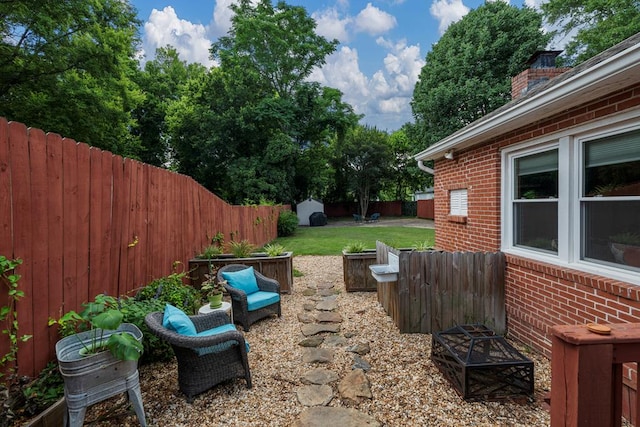 1445 22nd St, Columbus, GA 31901 - fenced backyard featuring a storage unit