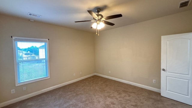 5 Rusty Dr, Phenix City, AL 36869 - carpeted spare room with a ceiling fan and baseboards