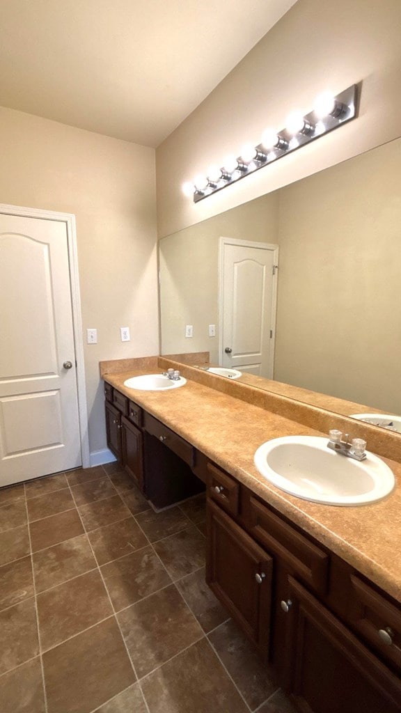 5 Rusty Dr, Phenix City, AL 36869 - full bathroom featuring double vanity and tile patterned flooring