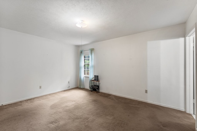 6256 Cricket Ln, Columbus, GA 31909 - carpeted spare room featuring baseboards and a textured ceiling