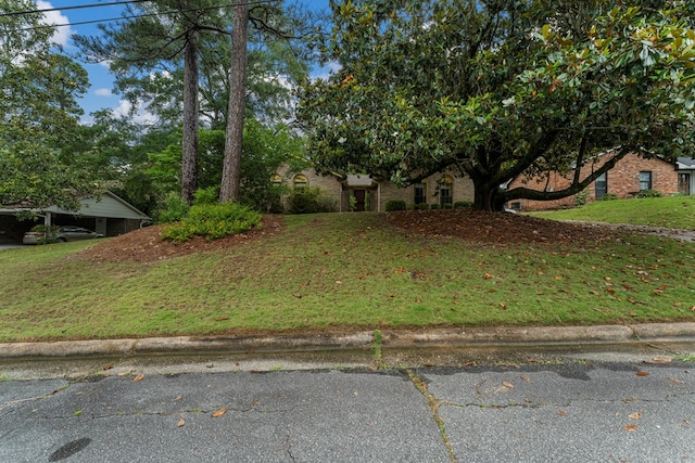 6256 Cricket Ln, Columbus, GA 31909 - obstructed view of property with a front lawn