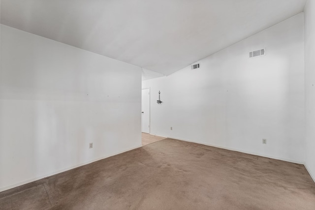 6256 Cricket Ln, Columbus, GA 31909 - empty room featuring carpet flooring and vaulted ceiling