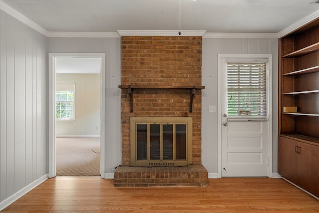 6256 Cricket Ln, Columbus, GA 31909 - unfurnished living room featuring a fireplace, wood finished floors, crown molding, and baseboards