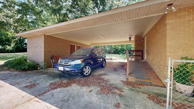 1225 Chaplin Dr, Columbus, GA 31904 - view of parking / parking lot featuring a carport and driveway