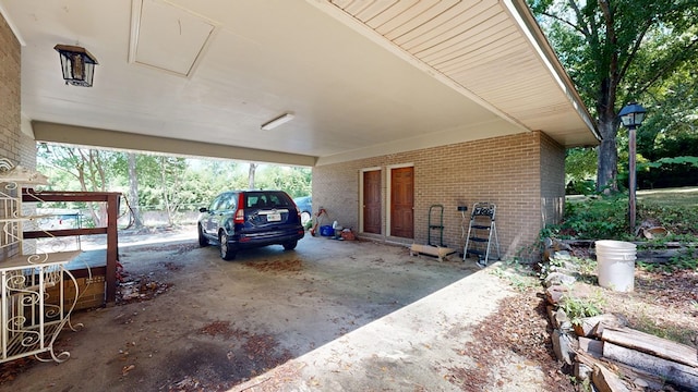 1225 Chaplin Dr, Columbus, GA 31904 - garage featuring a carport