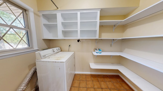 1225 Chaplin Dr, Columbus, GA 31904 - laundry area with washer / dryer, plenty of natural light, and light tile patterned flooring