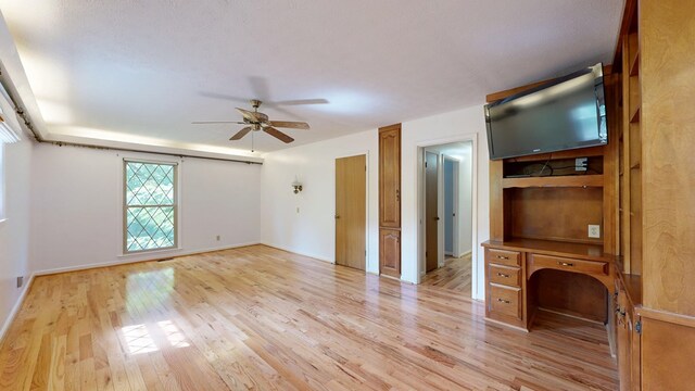 1225 Chaplin Dr, Columbus, GA 31904 - unfurnished living room featuring light wood-style floors and a ceiling fan