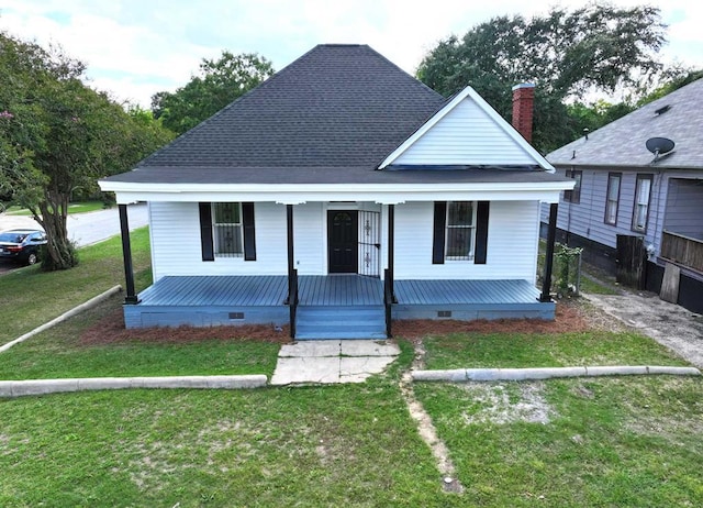 view of front of house featuring a porch and a front yard