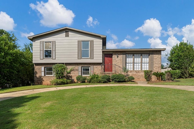 6248 Old Post Ct, Columbus, GA 31909 - split level home featuring brick siding and a front yard