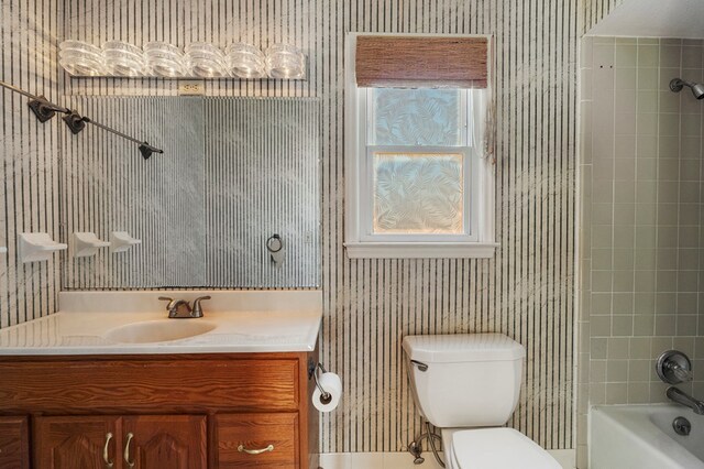 6248 Old Post Ct, Columbus, GA 31909 - bathroom with wallpapered walls, vanity, and bathtub / shower combination