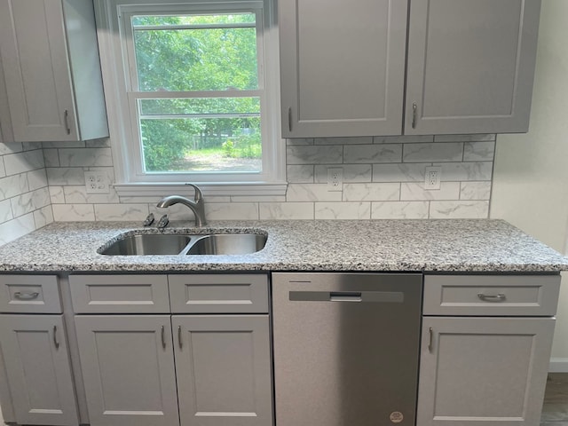 2618 Ogletree St, Columbus, GA 31909 - kitchen featuring dishwasher, gray cabinets, and healthy amount of natural light