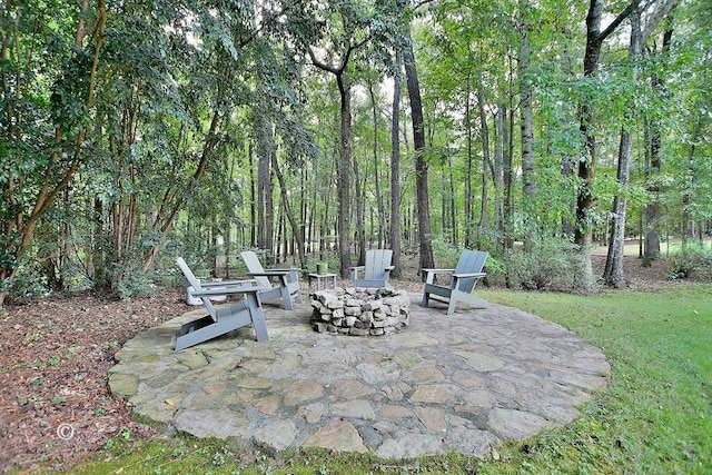 view of patio featuring a fire pit