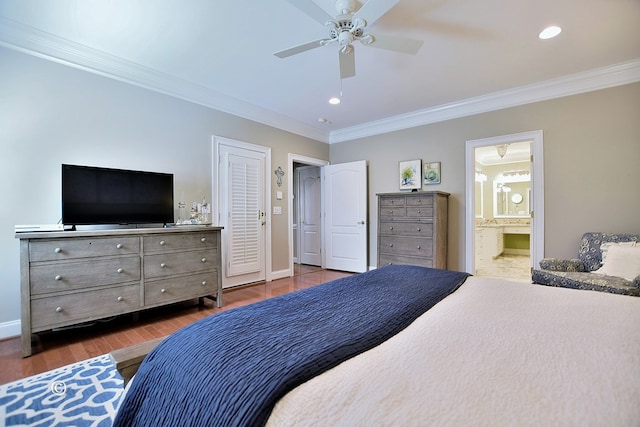 bedroom featuring ensuite bath, ceiling fan, crown molding, and wood-type flooring