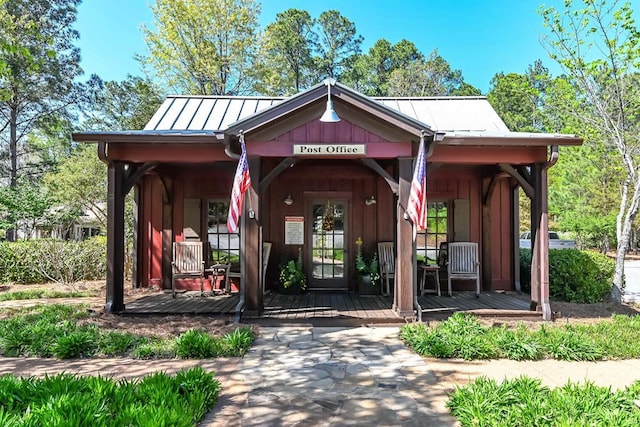 exterior space with a standing seam roof and metal roof