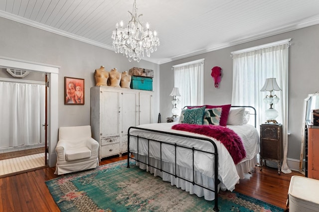17779 Main St, Woodbury, GA 30293 - bedroom with a chandelier, wood-type flooring, and ornamental molding