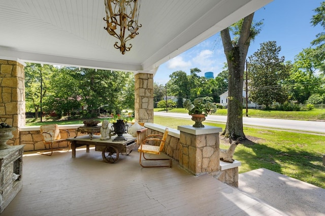 17779 Main St, Woodbury, GA 30293 - covered porch featuring a lawn and view of scattered trees