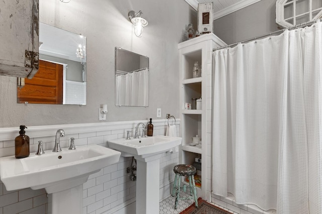 17779 Main St, Woodbury, GA 30293 - full bathroom featuring a wainscoted wall, a sink, and tile walls