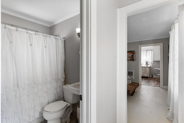17779 Main St, Woodbury, GA 30293 - bathroom with ornamental molding, toilet, and a shower with shower curtain