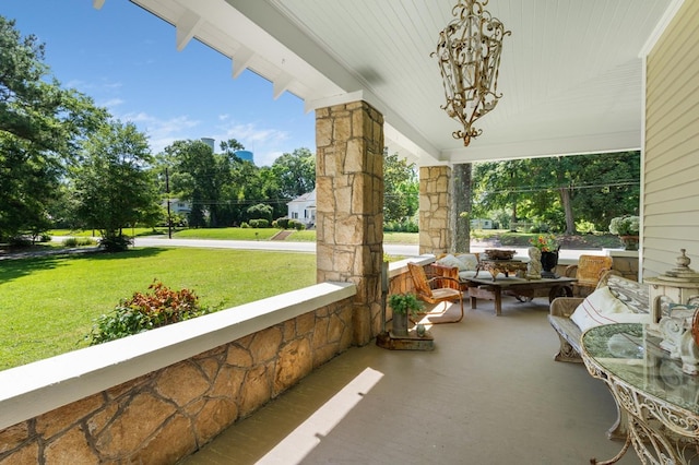17779 Main St, Woodbury, GA 30293 - porch featuring a lawn