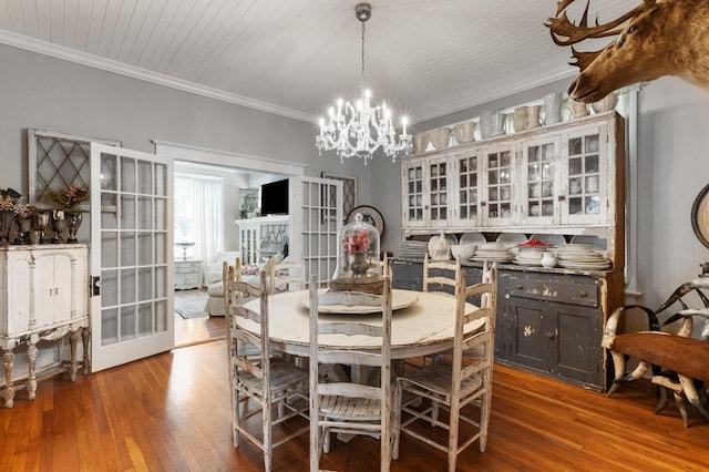 17779 Main St, Woodbury, GA 30293 - dining space with a chandelier, hardwood / wood-style floors, crown molding, and french doors