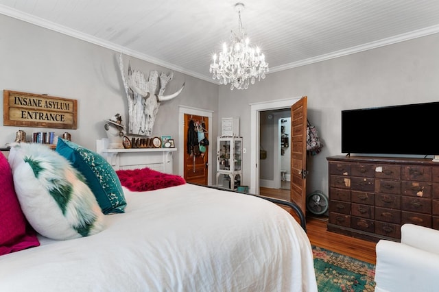 17779 Main St, Woodbury, GA 30293 - bedroom featuring a chandelier, wood finished floors, and crown molding