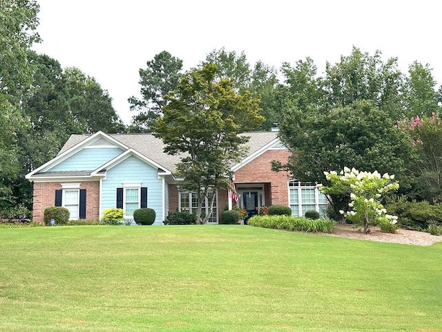 4804 Champions Way, Columbus, GA 31909 - view of front of home with a front lawn, brick siding, and a shingled roof