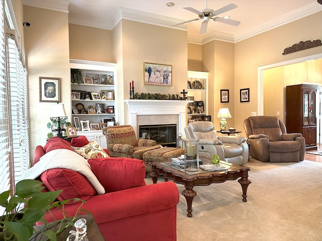 4804 Champions Way, Columbus, GA 31909 - carpeted living room with ceiling fan, a glass covered fireplace, and crown molding