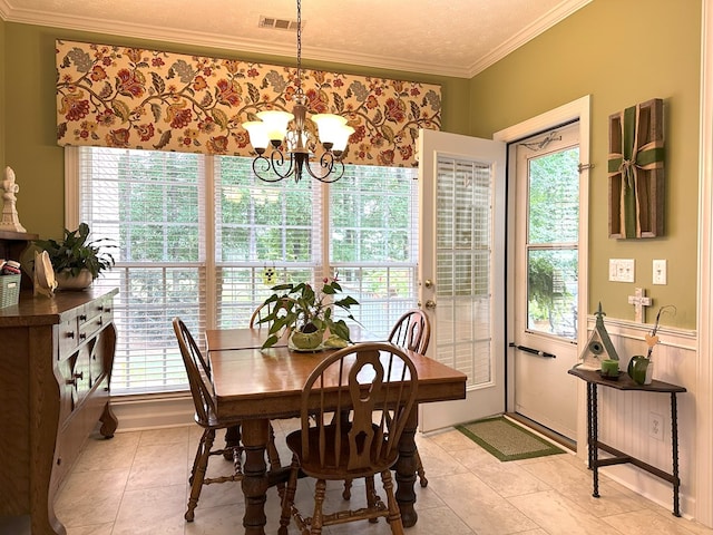 4804 Champions Way, Columbus, GA 31909 - dining room featuring ornamental molding, plenty of natural light, a chandelier, and light tile patterned floors