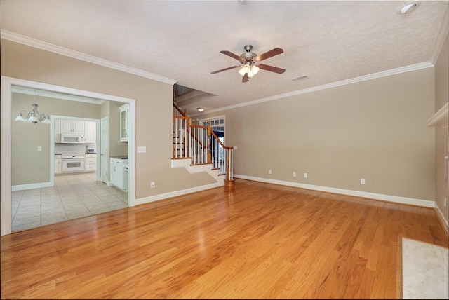 4589 Carnoustie Ln, Columbus, GA 31909 - unfurnished living room featuring ceiling fan, stairway, a chandelier, light wood-style flooring, and ornamental molding