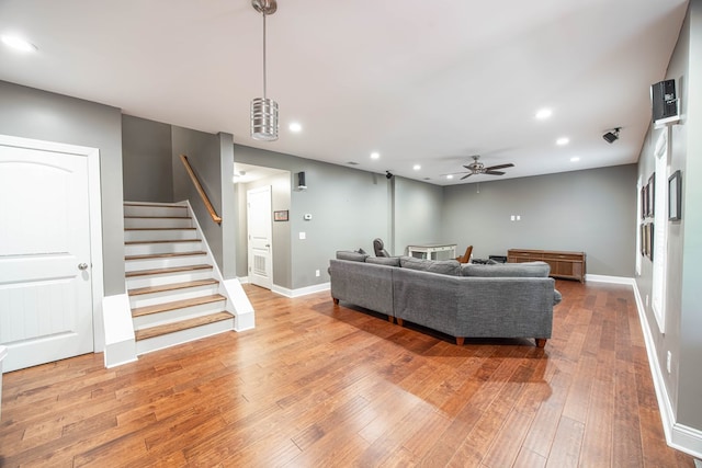 6027 Wellesley Dr, Columbus, GA 31904 - living room with ceiling fan, recessed lighting, hardwood / wood-style flooring, baseboards, and stairway
