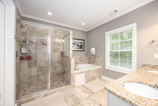 6027 Wellesley Dr, Columbus, GA 31904 - full bathroom with a garden tub, double vanity, a stall shower, ornamental molding, and recessed lighting