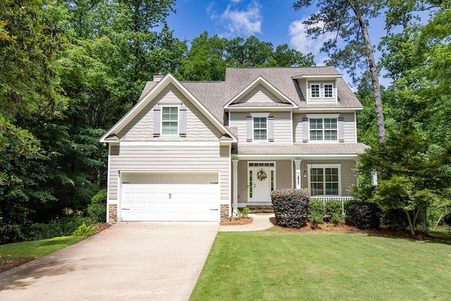 6027 Wellesley Dr, Columbus, GA 31904 - view of front of property featuring driveway, a front yard, a garage, covered porch, and roof with shingles
