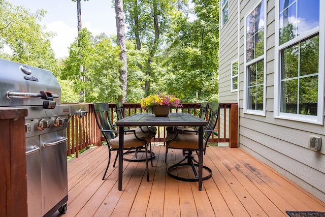 6027 Wellesley Dr, Columbus, GA 31904 - wooden deck featuring a grill and outdoor dining space