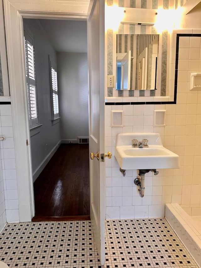 bathroom with tile patterned floors and sink