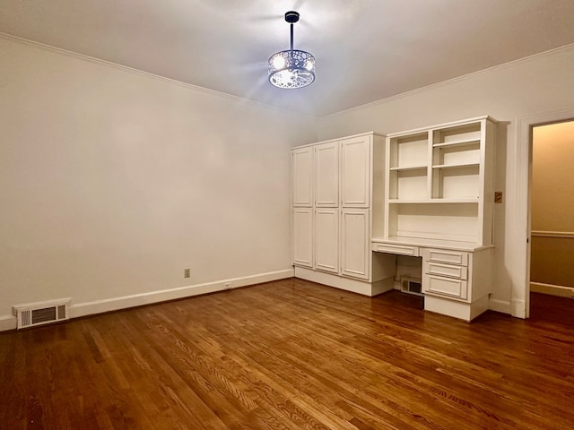 unfurnished bedroom featuring dark hardwood / wood-style floors