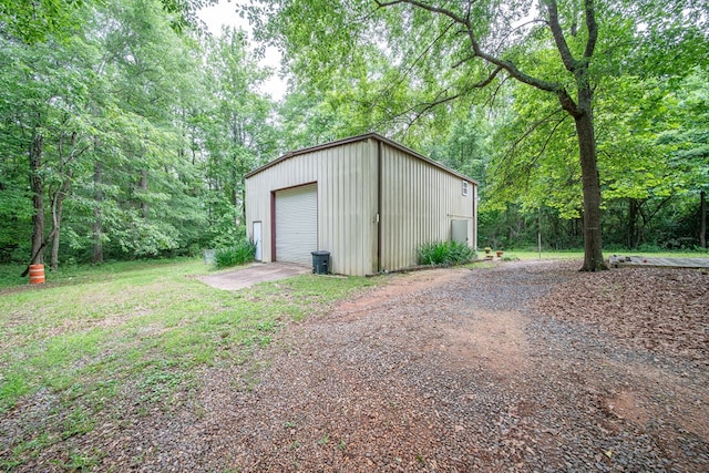 5604 Holland Dr, Columbus, GA 31909 - view of outbuilding with driveway and an outbuilding