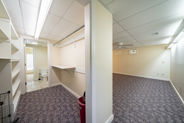 5604 Holland Dr, Columbus, GA 31909 - basement featuring carpet, a drop ceiling, baseboards, and ceiling fan