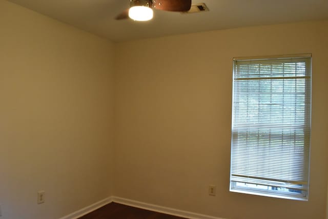 spare room with ceiling fan